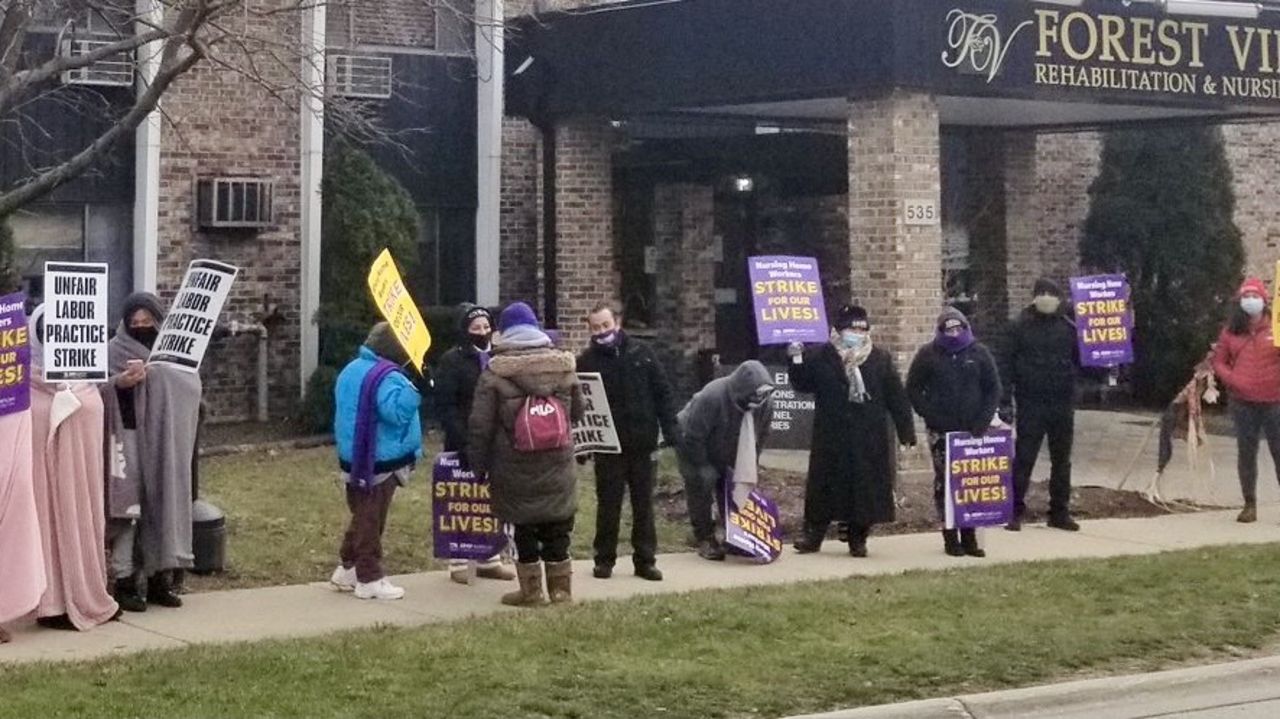 Illinois nursing home workers strike in second week as pandemic surges